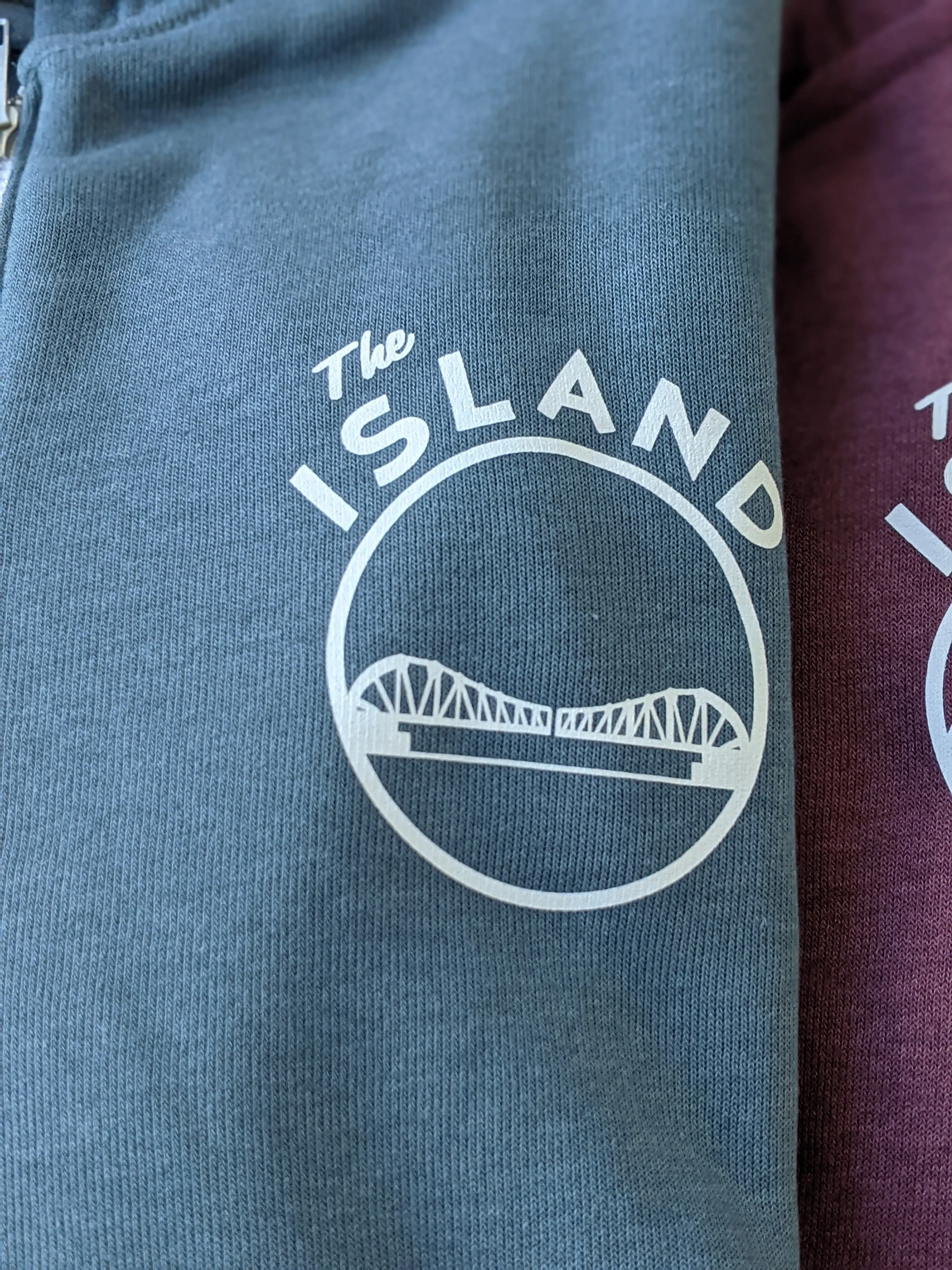 THE ISLAND ZIP-UP HOODIE